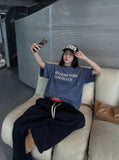 DAXUEN Vintage acid-wash graphic t-shirt — model photo