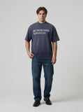 DAXUEN Vintage acid-wash graphic t-shirt — model photo