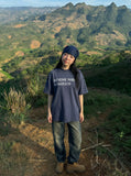 DAXUEN Vintage acid-wash graphic t-shirt — model photo