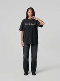DAXUEN Vintage black short-sleeve graphic t-shirt — model photo