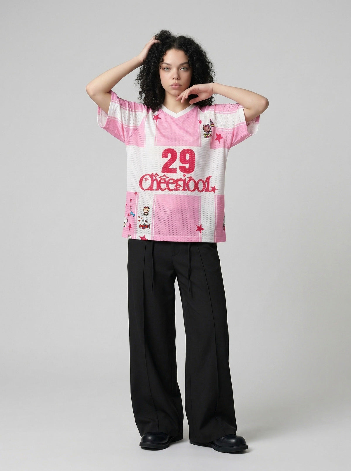 DAXUEN Relaxed-fit jersey-style T-shirt with cartoon graphics — model photo