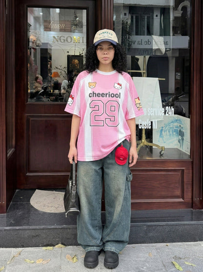 DAXUEN Relaxed-fit jersey-style T-shirt with cartoon graphics — model photo