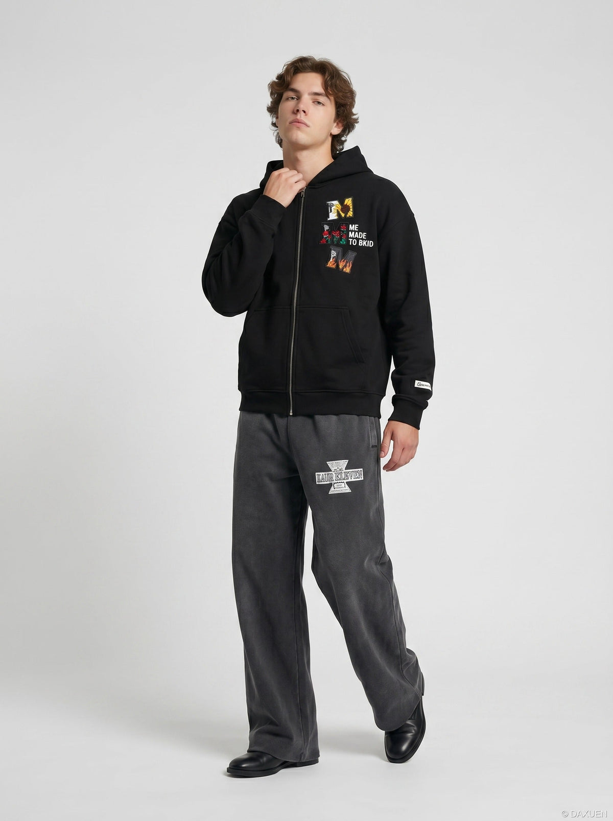 DAXUEN Wide-leg sweatpants with graphic print — model photo