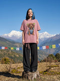 DAXUEN Oversized dusty pink/mauve t-shirt with dachshund graphic — model photo