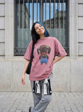 DAXUEN Oversized dusty pink/mauve t-shirt with dachshund graphic — model photo