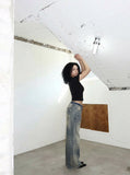 DAXUEN Wide-leg distressed denim pants — model photo