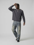 DAXUEN Distressed wide-leg jeans in washed light blue denim — model photo