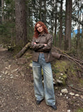 DAXUEN Distressed wide-leg jeans in washed light blue denim — model photo