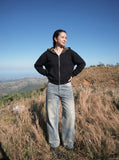 DAXUEN Distressed wide-leg jeans in washed light blue denim — model photo