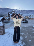 DAXUEN Vintage graphic Henley T-shirt with distressed print — model photo