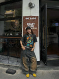 DAXUEN Vintage graphic print short-sleeved T-shirt — model photo