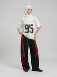 DAXUEN Vintage graphic V-neck t-shirt — model photo