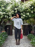 DAXUEN Light grey short-sleeved polo shirt with embroidered details — model photo