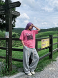DAXUEN pink oversized vintage monochrome graphic t-shirt — model photo