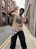 DAXUEN pink oversized vintage monochrome graphic t-shirt — model photo