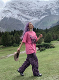 DAXUEN pink oversized vintage monochrome graphic t-shirt — model photo
