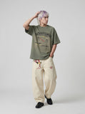 DAXUEN Olive green short-sleeved graphic t-shirt with dog print — model photo