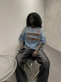 DAXUEN Vintage ombre graphic T-shirt with multiple designs — model photo