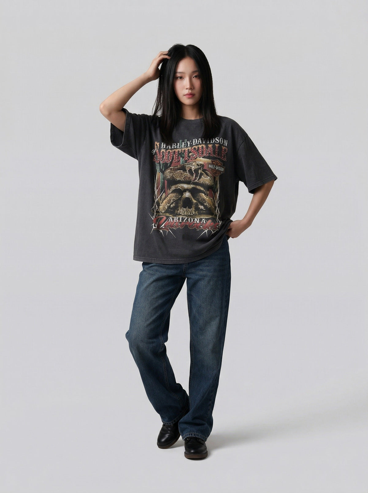 DAXUEN Oversized vintage graphic t-shirt with snake and skull design — model photo