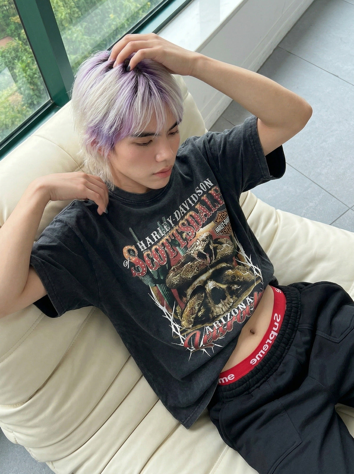 DAXUEN Oversized vintage graphic t-shirt with snake and skull design — model photo