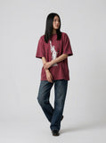 DAXUEN Oversized short-sleeved T-shirt with Statue of Liberty graphic — model photo