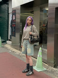 DAXUEN Light blue washed denim shorts with a relaxed fit — model photo