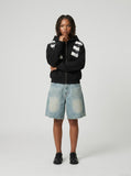DAXUEN Light blue washed denim shorts with a relaxed fit — model photo