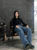 DAXUEN Loose wide leg denim jeans in medium blue wash — model photo