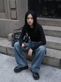 DAXUEN Loose wide leg denim jeans in medium blue wash — model photo
