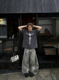 DAXUEN Oversized vintage wash graphic t-shirt — model photo