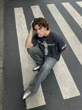 DAXUEN Oversized vintage wash graphic t-shirt — model photo