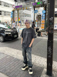 DAXUEN Oversized vintage wash graphic t-shirt — model photo