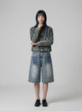 DAXUEN Wide-leg denim shorts with distressed finish — model photo