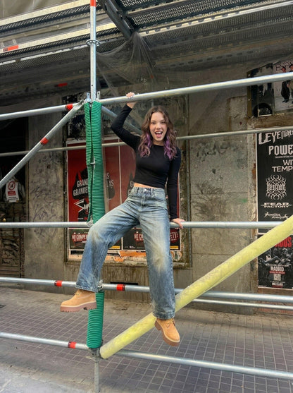 DAXUEN High-waisted wide-leg jeans in faded medium blue denim — model photo
