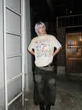 DAXUEN Vintage-washed graphic t-shirt with collage print — model photo