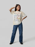 DAXUEN Vintage-washed graphic t-shirt with collage print — model photo