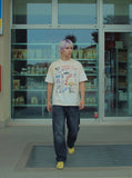 DAXUEN Vintage-washed graphic t-shirt with collage print — model photo