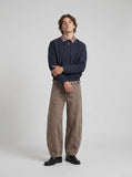 DAXUEN Wide leg denim pants with curved panels and topstitching — model photo
