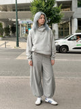 DAXUEN Light grey wide-leg trousers with pinstripes — model photo