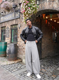 DAXUEN Light grey wide-leg trousers with pinstripes — model photo