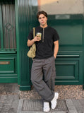 DAXUEN Black vintage washed short-sleeve t-shirt with zipper — model photo