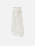 DAXUEN Women's wide-leg balloon pants with cherry blossom embroidery — model photo