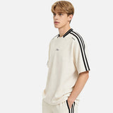 DAXUEN Oversized V-neck t-shirt with waffle knit texture and embroidery