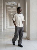 DAXUEN Oversized V-neck t-shirt with waffle knit texture and embroidery — model photo