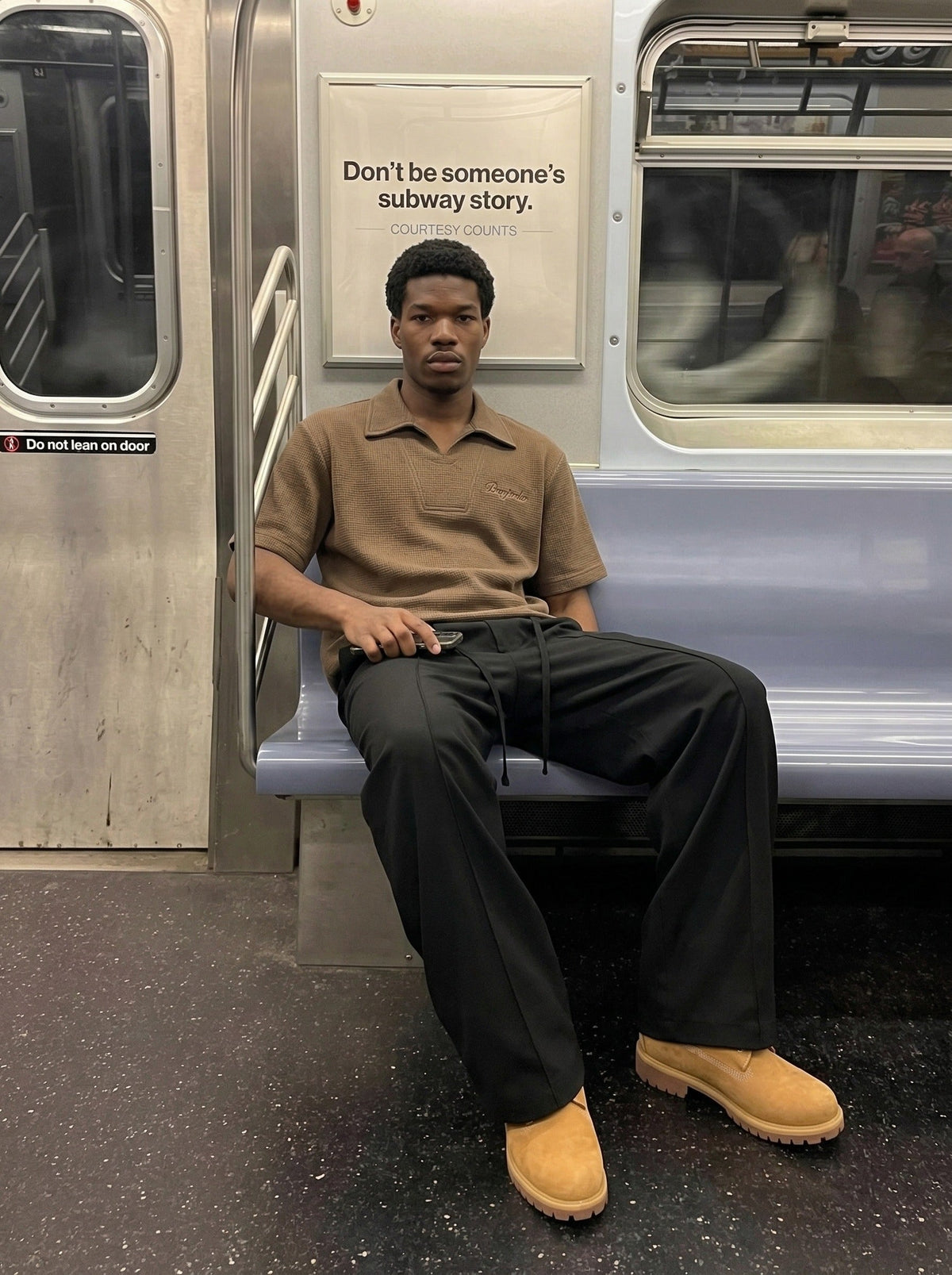DAXUEN Waffle knit short sleeve polo shirt in brown and black — model photo