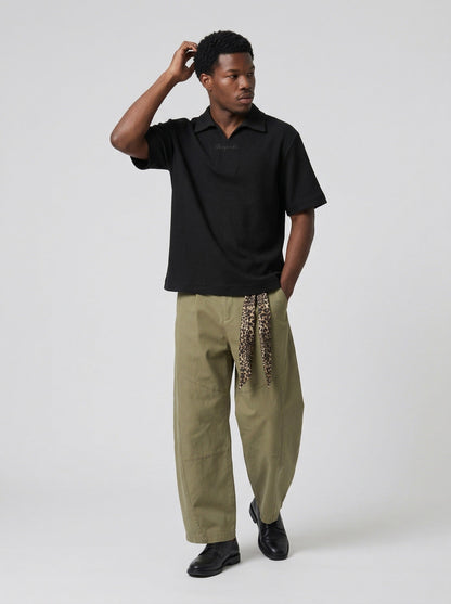DAXUEN Waffle knit short sleeve polo shirt in brown and black — model photo