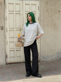 DAXUEN Oversized striped short-sleeved t-shirt — model photo