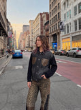 DAXUEN dark washed black denim with cable knit sleeves jacket — model photo