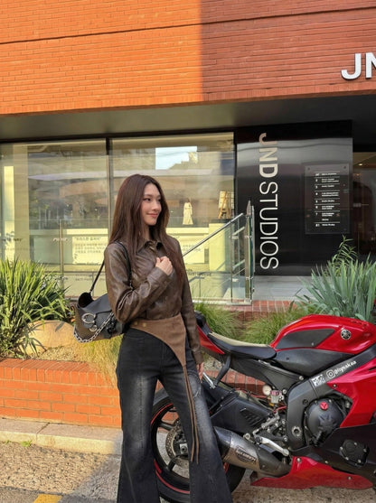 DAXUEN Washed black flared jeans with brown faux suede panel — model photo
