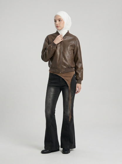 DAXUEN Washed black flared jeans with brown faux suede panel — model photo